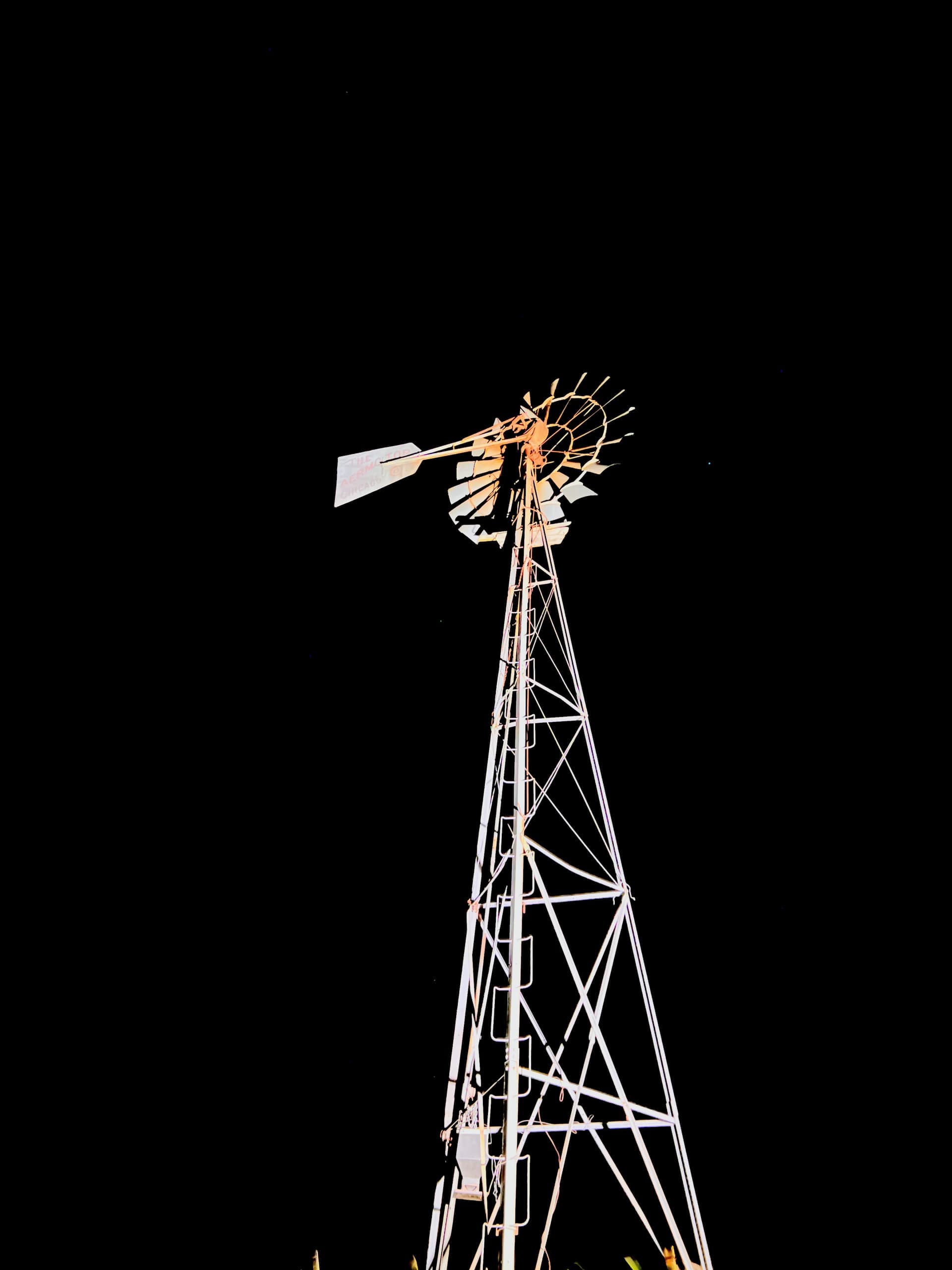 Ranch windmill at night